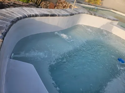 Custom 6000L jacuzzi with heat pump to save electricity and overflow to swimming pool