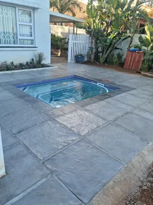 Small splash pool with real tile mosaics, and solar heating